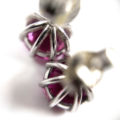 Lot 65 - A pair of 18ct (tested) white gold pink...