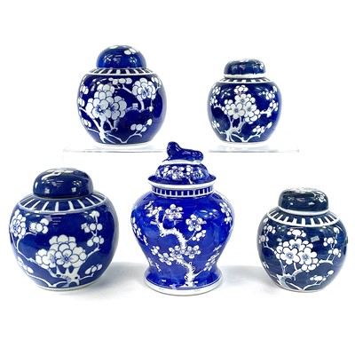Lot 148 - Five Chinese blue and white prunus pattern...
