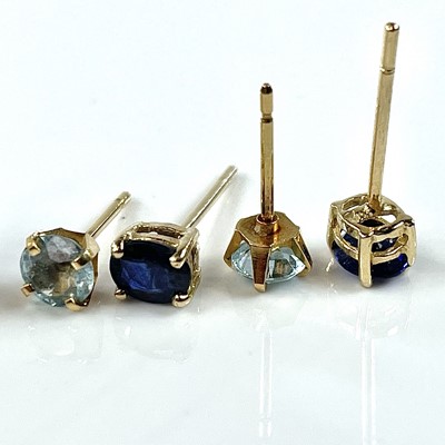 Lot 103 - A pair of blue sapphire set stud earrings,;...
