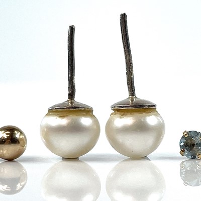 Lot 103 - A pair of blue sapphire set stud earrings,;...