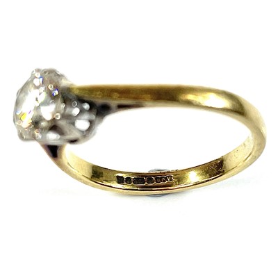 Lot 4 - An 18ct gold diamond solitaire ring, the round...