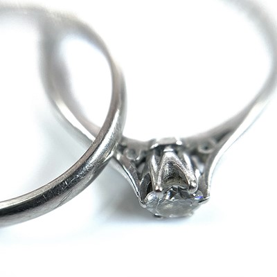 Lot 45 - A platinum diamond solitaire ring, the diamond...
