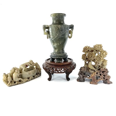 Lot 122 - A Chinese carved hardwood vase stand, early...