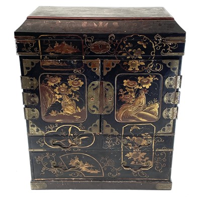 Lot 205 - A Japanese black lacquer table cabinet, late...