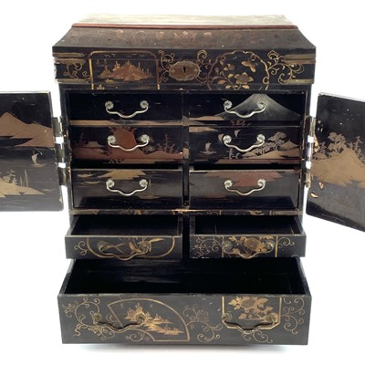 Lot 205 - A Japanese black lacquer table cabinet, late...