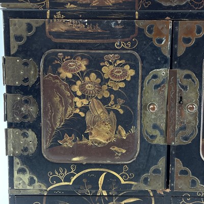 Lot 205 - A Japanese black lacquer table cabinet, late...