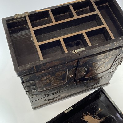 Lot 205 - A Japanese black lacquer table cabinet, late...