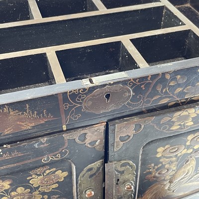 Lot 205 - A Japanese black lacquer table cabinet, late...