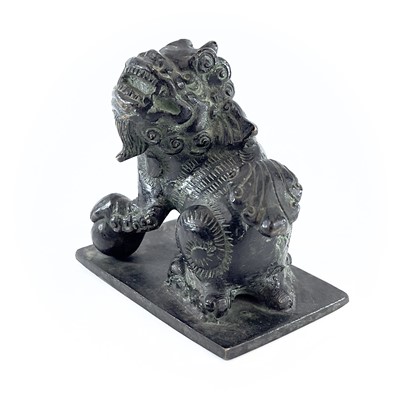 Lot 203 - A Chinese bronze of model of a dog of fo, the...