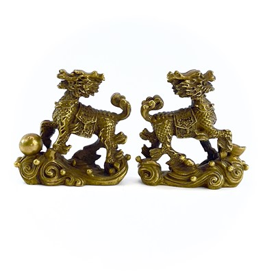 Lot 208 - A pair of Chinese gilt metal scroll weights in...