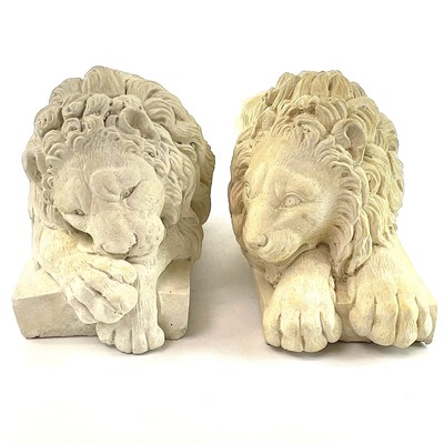 Lot 140 - A pair of plaster Chatsworth sleeping lions...