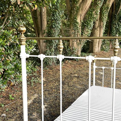 Lot 1856 - A brass and painted iron bed frame, in the...