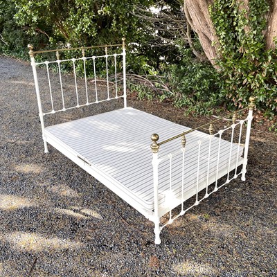 Lot 1856 - A brass and painted iron bed frame, in the...