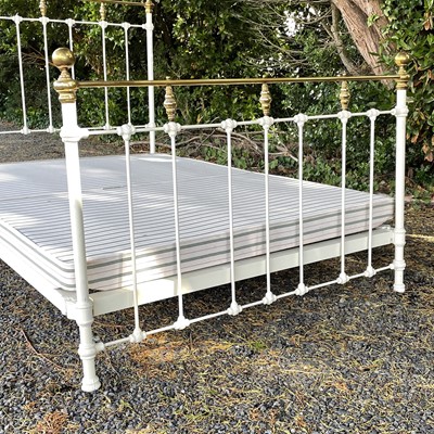 Lot 1856 - A brass and painted iron bed frame, in the...