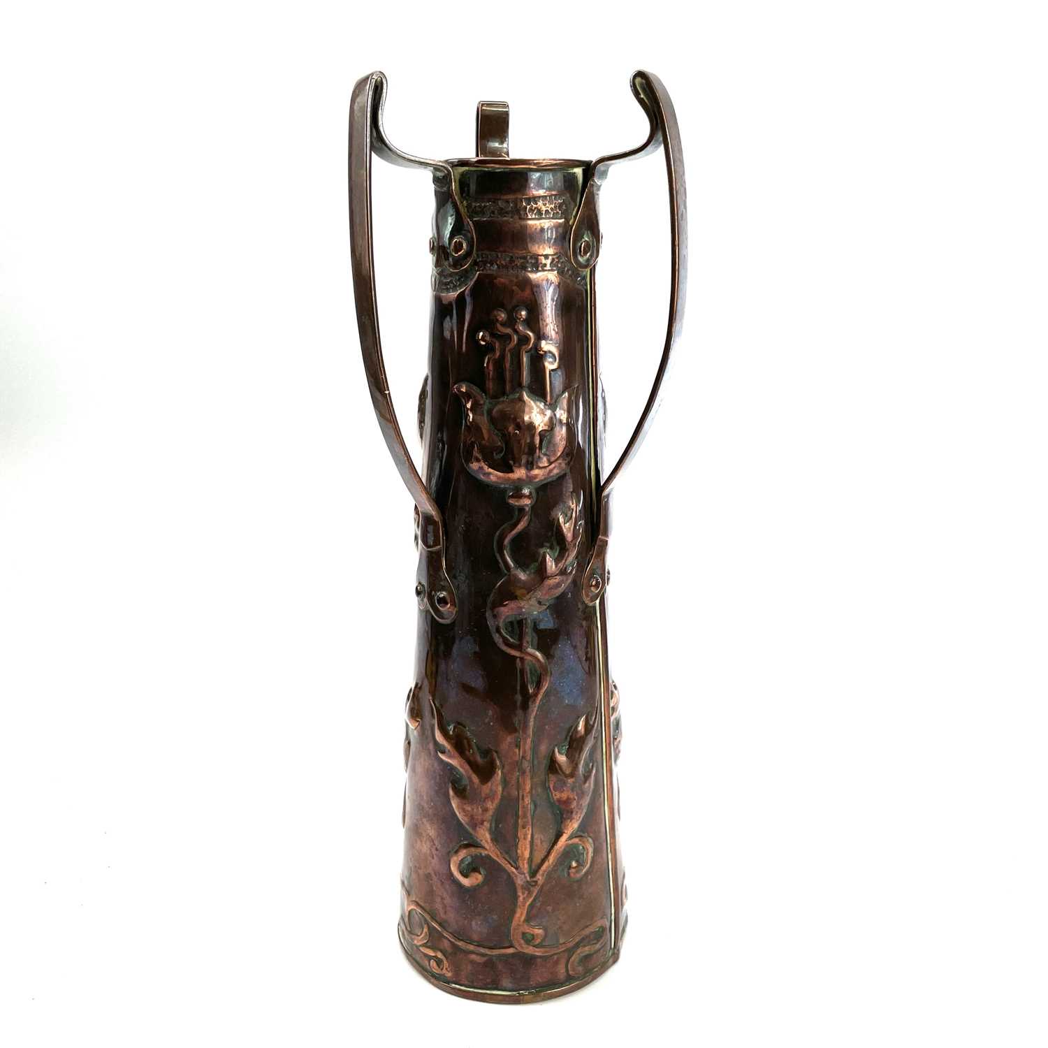 Lot 65 - An Art Nouveau copper three handle vase with...