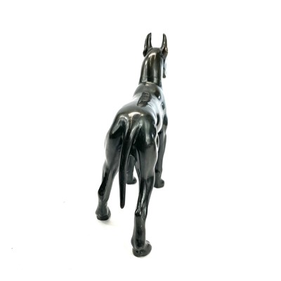 Lot 156 - A bronzed model of a standing Great Dane,...