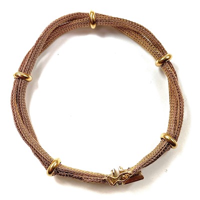 Lot 27 - An 18ct gold mesh twist double strand bracelet,...