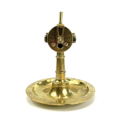Lot 190 - A 20th century brass cigar cutter in the form...