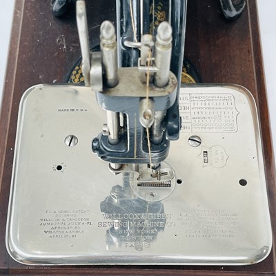 Lot 7 - A Willcox and Gibbs 'Silent' sewing machine,...