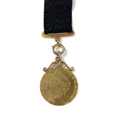 Lot 95 - A George III 1794 spade guinea coin mounted...