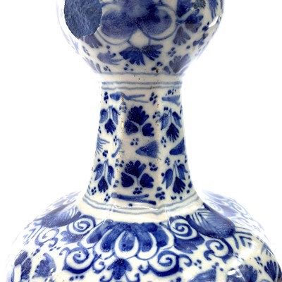 Lot 16 - A Delft blue and white pottery vase, 17th century.