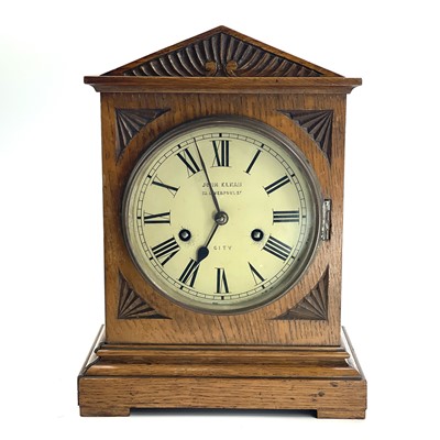 Lot 1703 - An oak mantel clock, German, circa 1900, the...