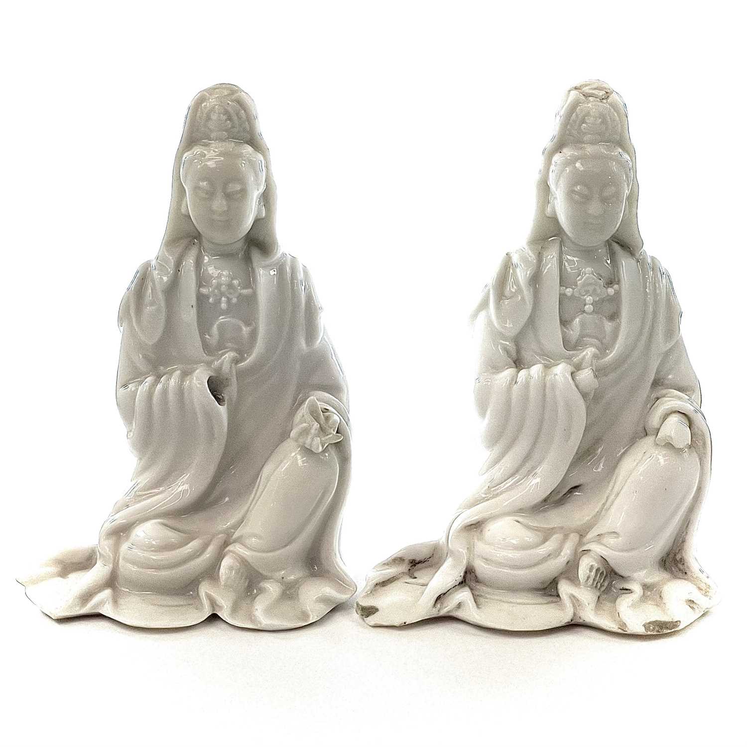 Lot 39 - Two Chinese blanc de chine figures of Guanyin,...