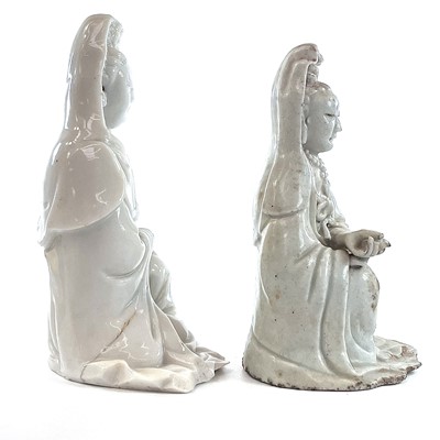 Lot 40 - Two Chinese blanc de chine figures of Guanyin,...