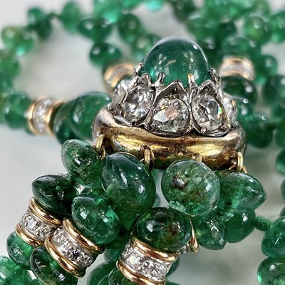 Lot 101 - Tambetti - A gold mounted emerald and diamond...