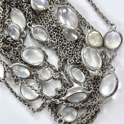 Lot 272 - A white metal long chain punctuated with oval...