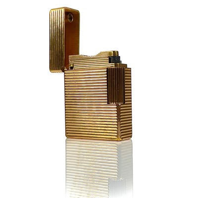 Lot 301 - A gold plated Dupont lighter, length 48mm.