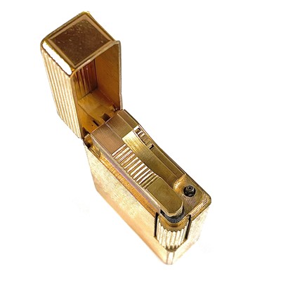 Lot 301 - A gold plated Dupont lighter, length 48mm.