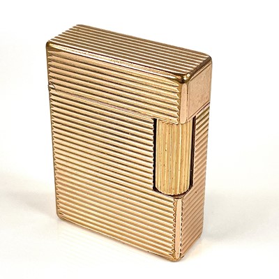 Lot 301 - A gold plated Dupont lighter, length 48mm.