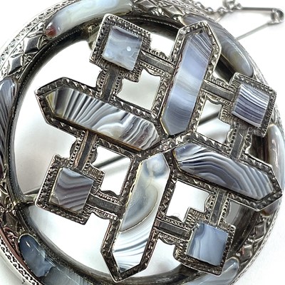 Lot 122 - A Scottish silver Montrose agate set brooch...