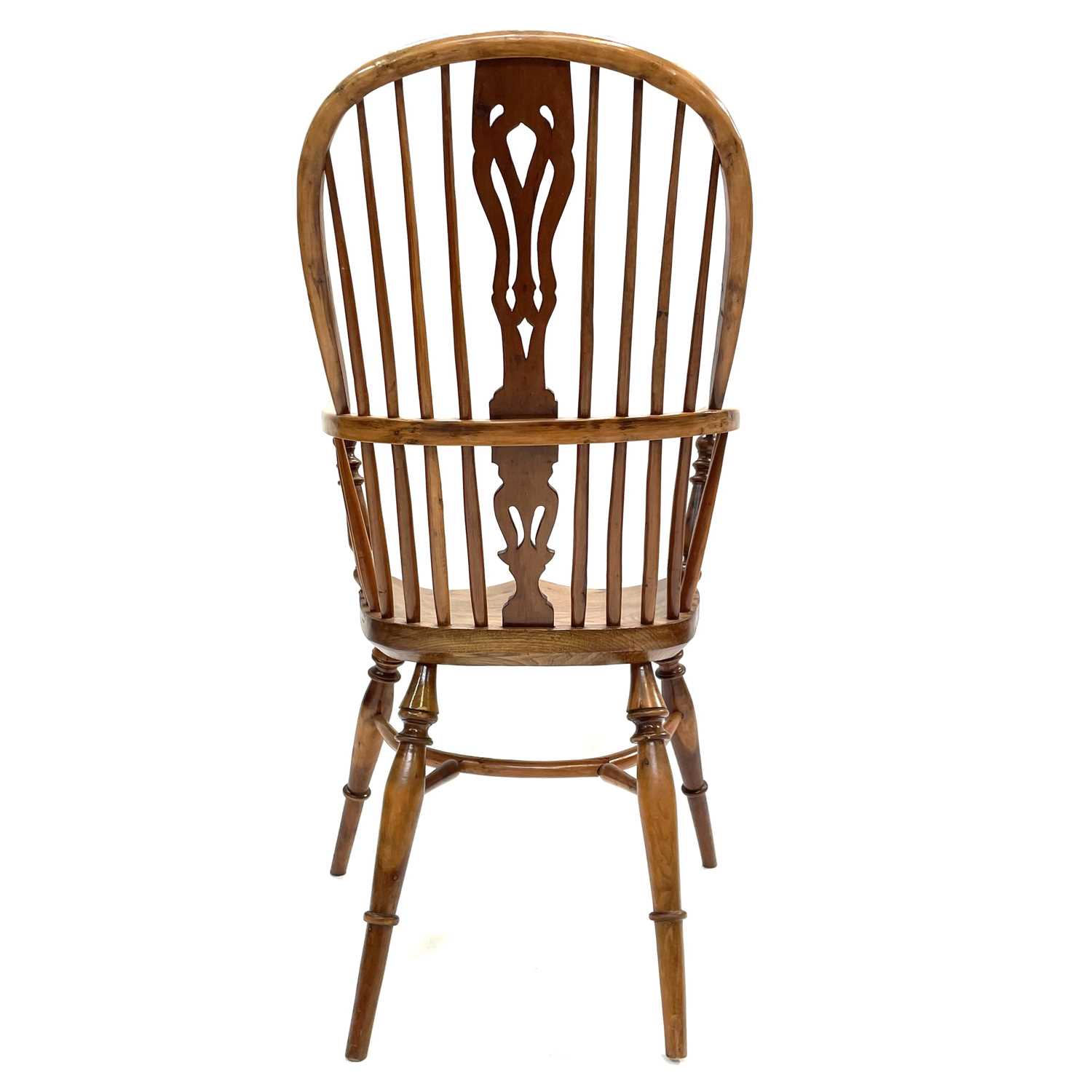 Lot 6 - An attractive yew wood Windsor armchair, 20th