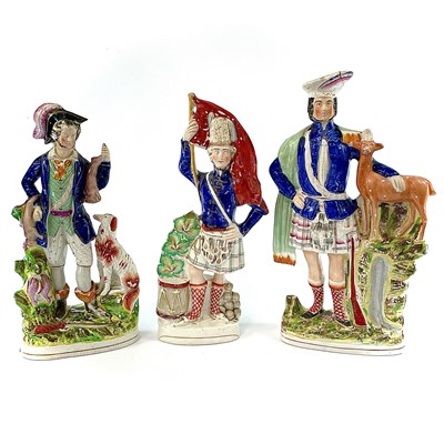 Lot 813 - A Staffordshire pottery figure of a sportsman,...