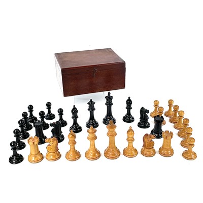 Lot 122 - A Staunton pattern boxwood and ebony chess set,...