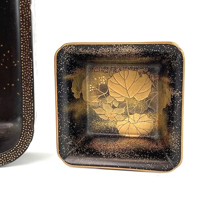 Lot 89 - A Japanese black and gilt lacquered tray,...