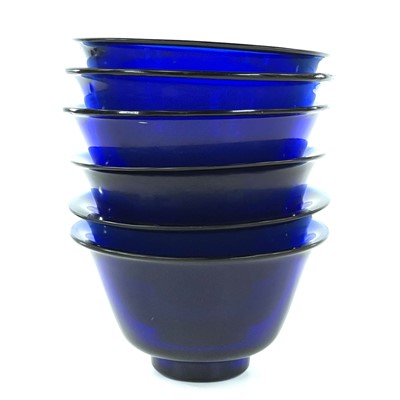 Lot 211 - Six Peking blue glass bowls, largest height...