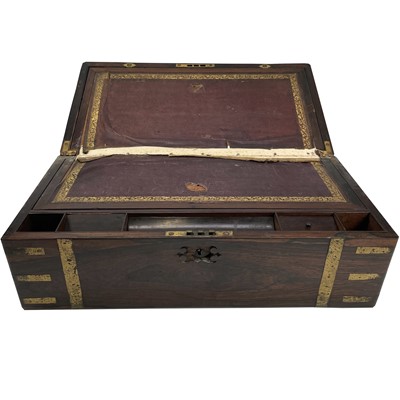 Lot 55 - A Victorian rosewood and brass bound writing...