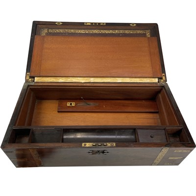 Lot 55 - A Victorian rosewood and brass bound writing...