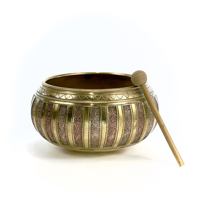 Lot 234 - A Tibetan mixed metal singing bowl, height...