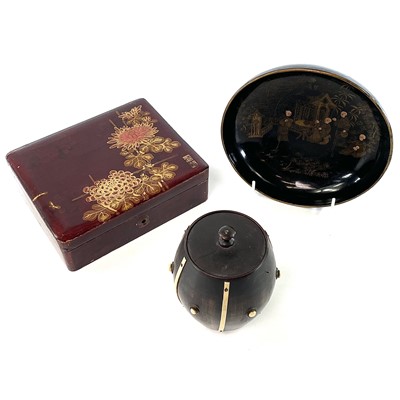 Lot 240 - A Chinese black lacquer papier mache footed...