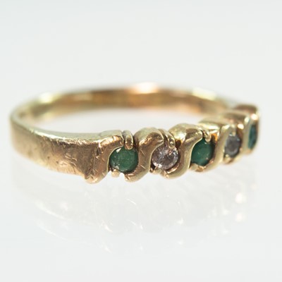 Lot 96 - A modern 9ct hallmarked gold emerald and diamond five stone ring.