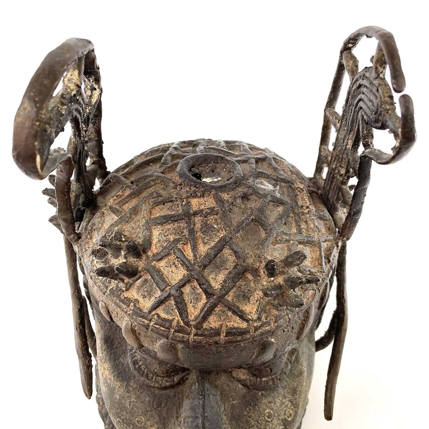 Lot 235 - A Benin heavy bronze head of an oba, 20th