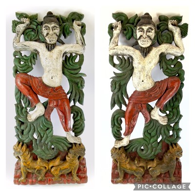 Lot 254 - A pair of Chinese painted carved wood panels,...