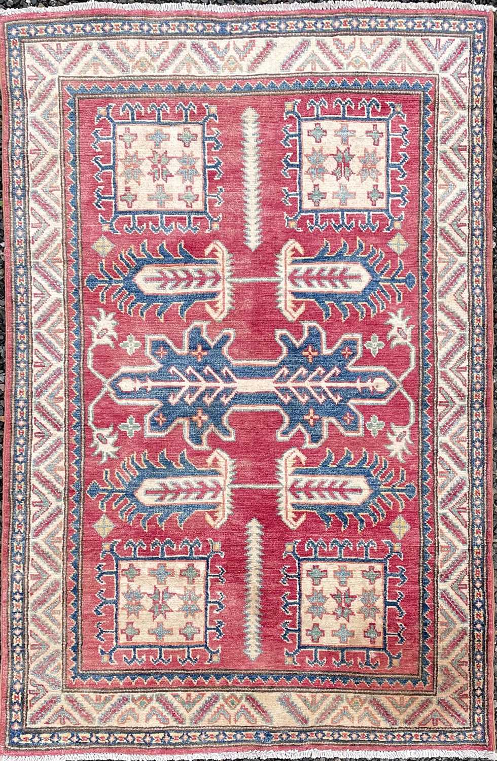 Lot 1227 - A Ziegler Chobi type rug, the red field