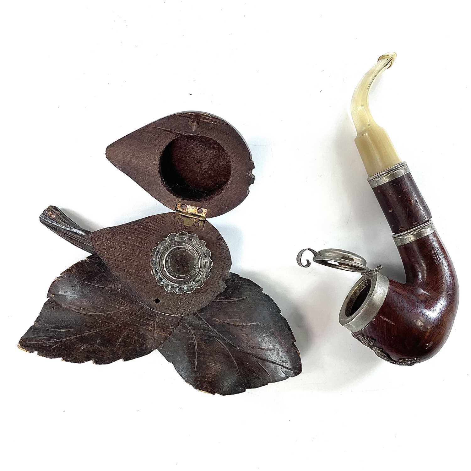 Lot 141 - A late 19th century fruitwood carved ink well...