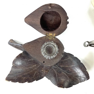 Lot 141 - A late 19th century fruitwood carved ink well...