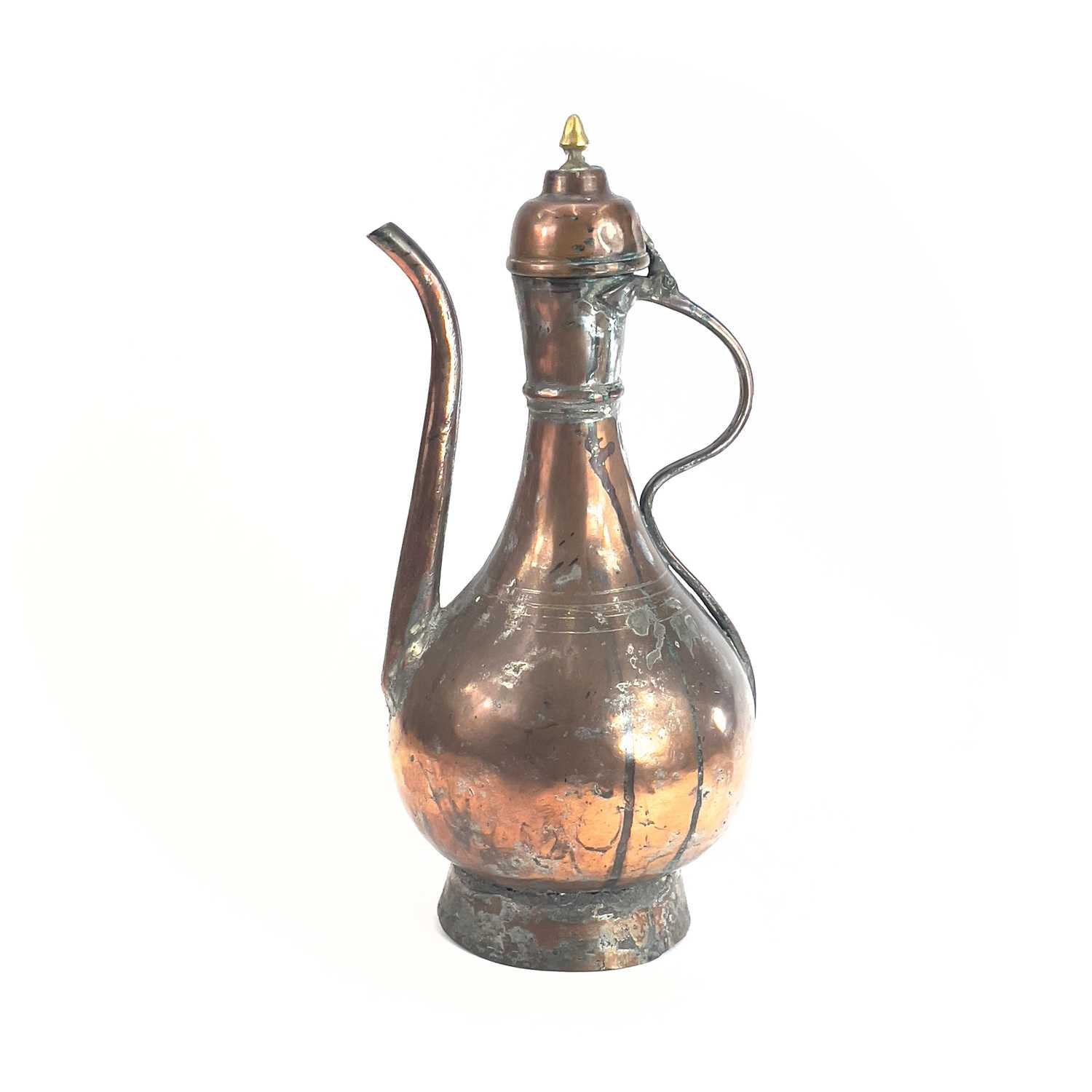 Lot 1021 - An Islamic tinned copper ewer, 19th century,...